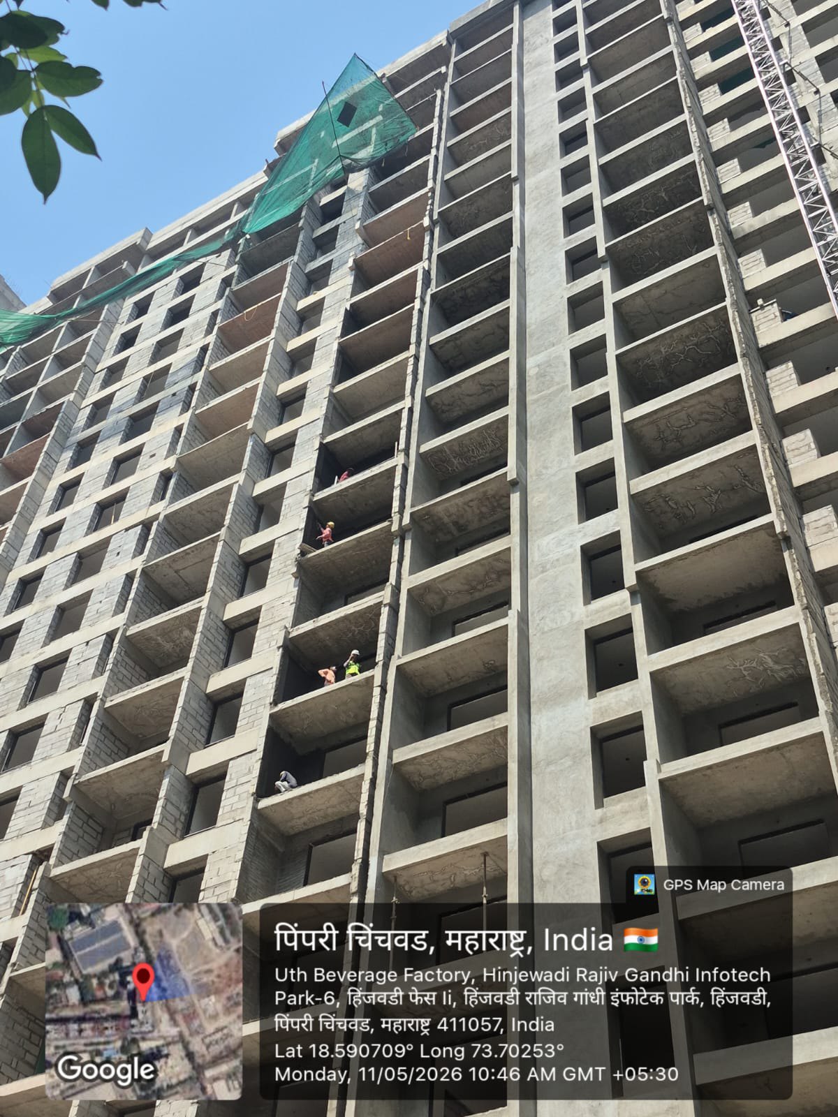 High-rise civil construction progress with site location overlay