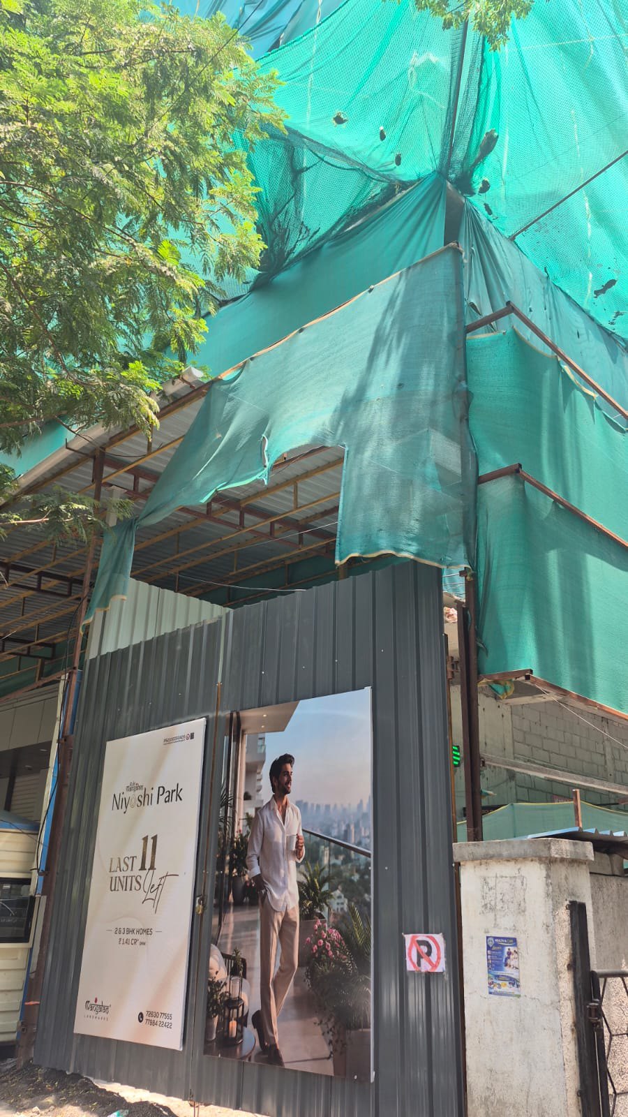 Niyoshi Park site frontage with green safety netting